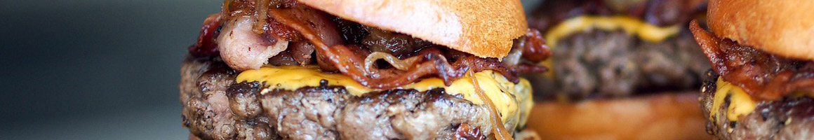 Eating Burger Sandwich at Flip City Shakes restaurant in Southampton, PA.
